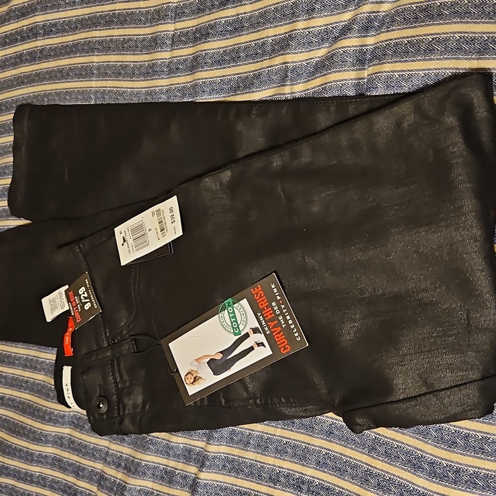 Celebrity pink jeans black sheen